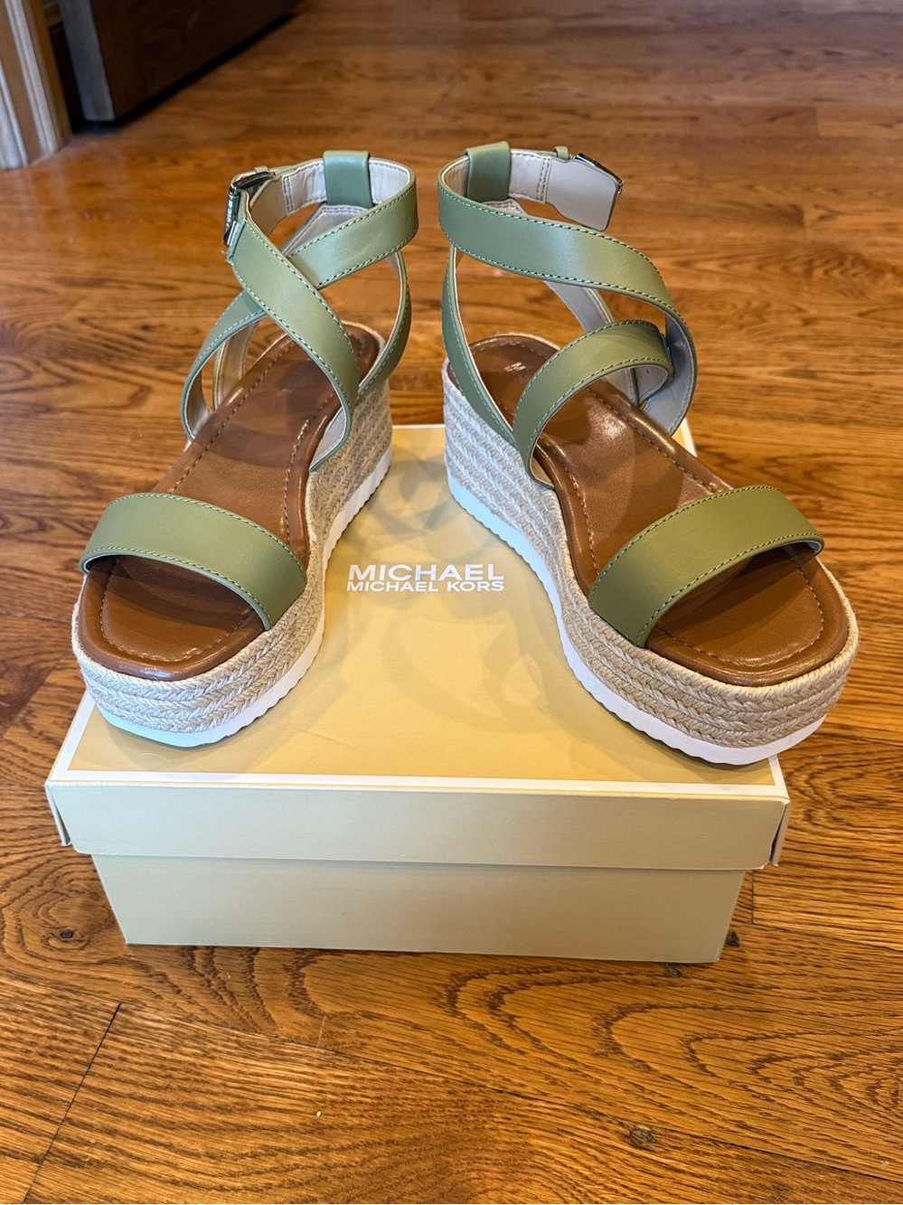 New, Unworn Michael Kors Lowry Wedge sandals in an oregano green color